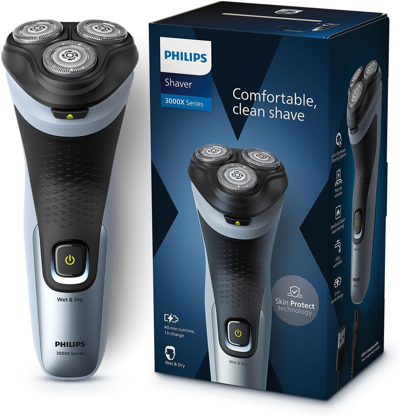 Philips X 3063/ Shaver by Philips — product image showing the trimmer body, blade head and attachments